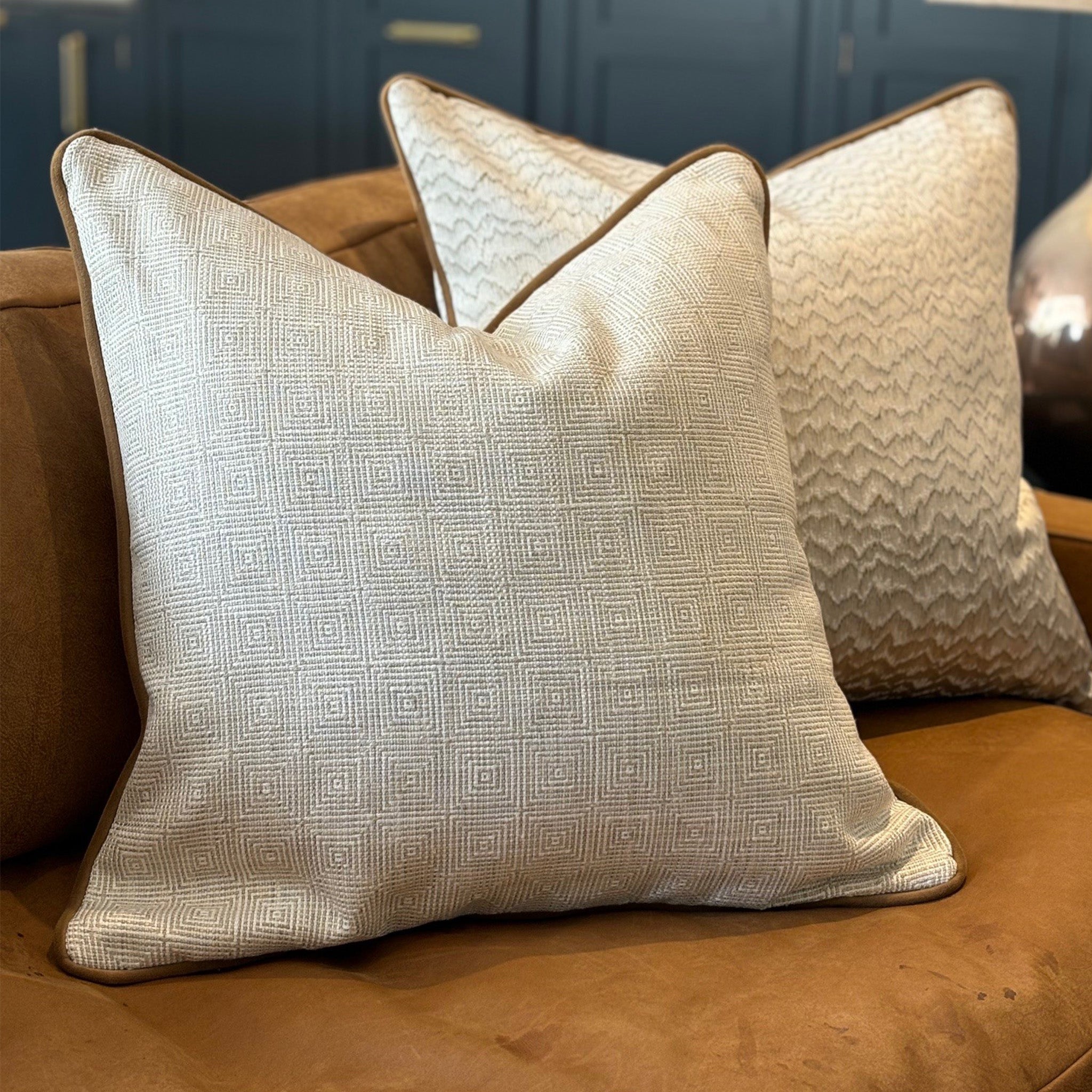 Ecru Geometric Patterned Cushion with Tan Piping
